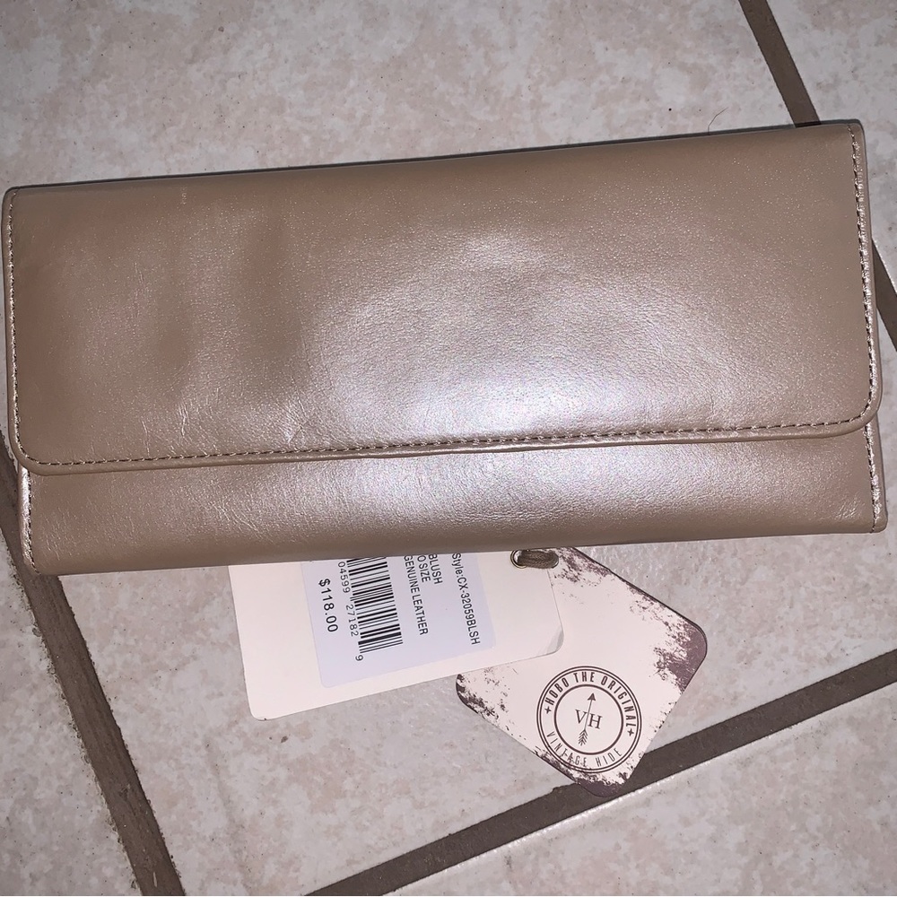 New w/tags Hobo vintage leather wallet in a soft metallic blush color wallet